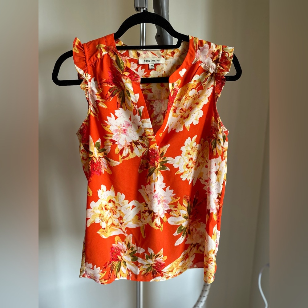 Rose + Olive sleeveless top. Orange floral print. Size extra small.
